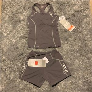 NWT 2XU Tri Singlet and Tri Short size XS in Purple Ash